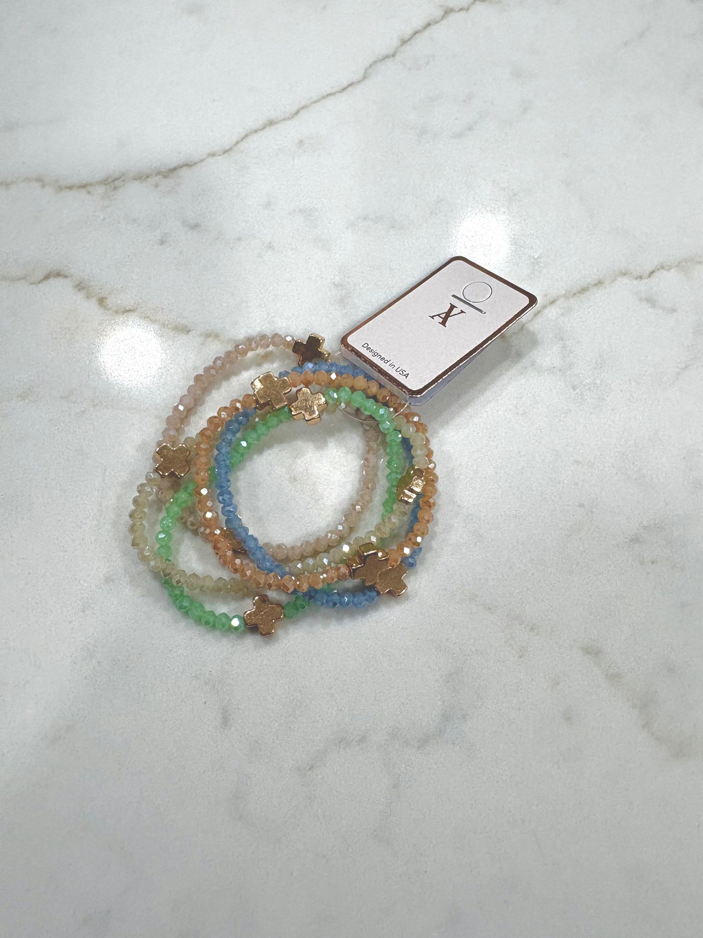 Light multi colored beaded cross stack