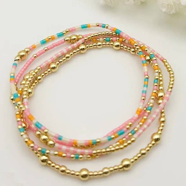 Multi layering bracelet pink/gold