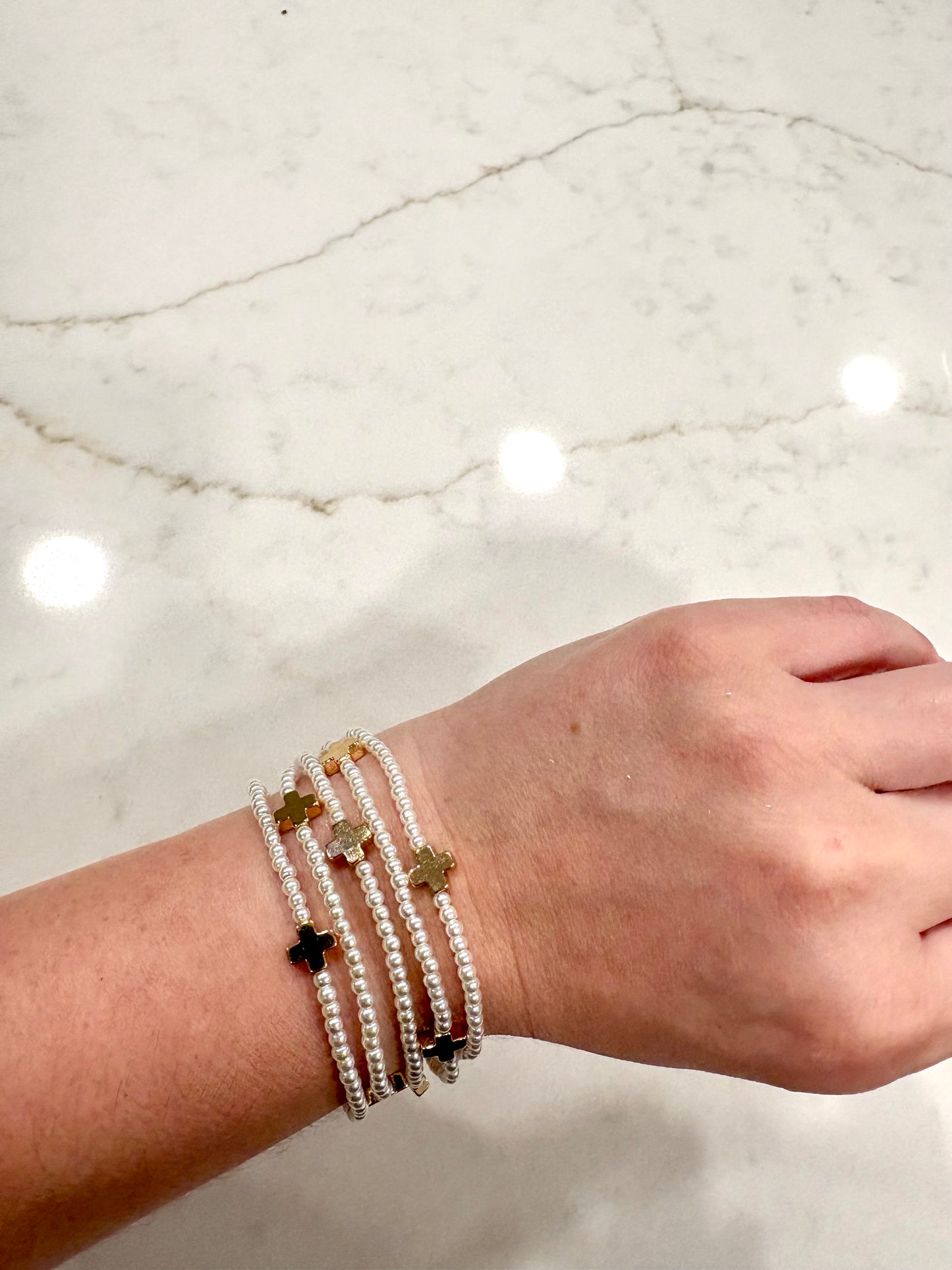 Cross multi layered pearl beaded stretch bracelet