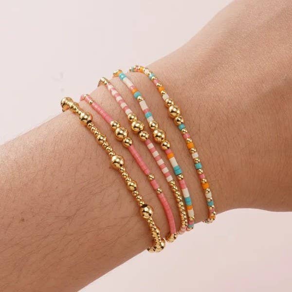 Multi layering bracelet pink/gold